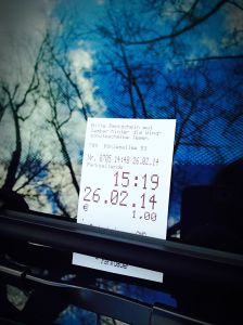 Close-Up Of Parking Ticket On Car