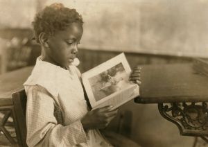 Young Girl Reading Book in Classroom, Pleasant Green School, Marlinton, Pocahontas County, West Virginia, USA, circa 1921