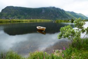 Europe. Norway. Lofoten. Digerneset area. a boat in a stllness lake