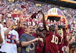 LANDOVER, MD - SEPTEMBER 12: Fans cheer before the game between