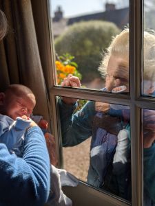 New Mum Introduces Newborn Son to Grandmother Through Glass Window on Mother Sunday