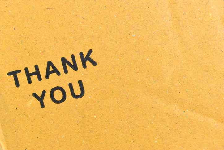 thank you wording on cardboard box texture background